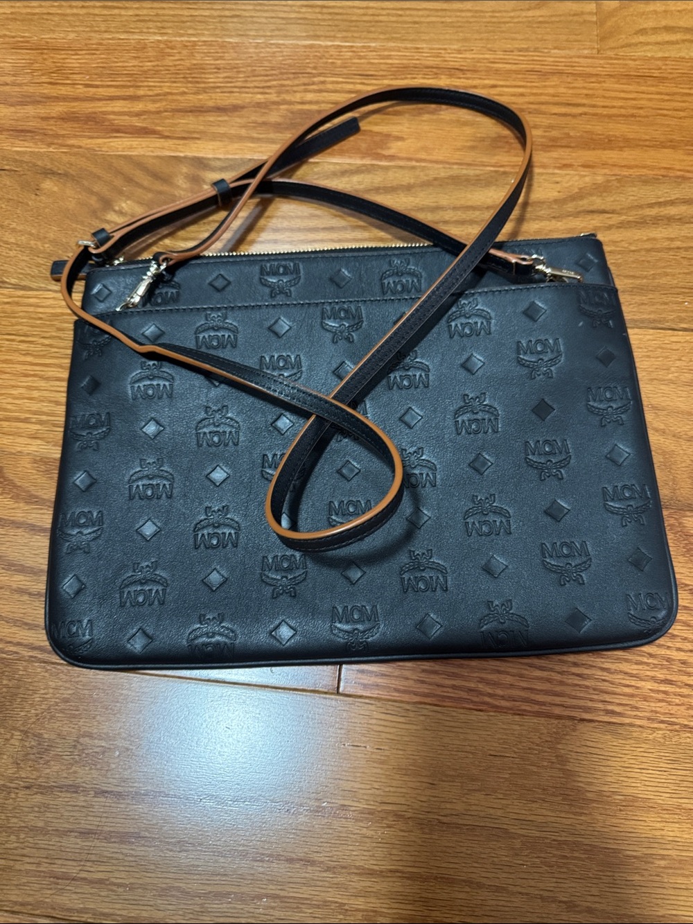 MCM Black Embossed Leather Messenger Crossbody with Brown Trim